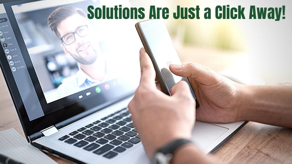 Person using phone and laptop