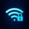 Glowing neon Wifi locked icon isolated on brick wall background. Password Wi-fi symbol. Wireless Network icon. Wifi zone. Vector Illustration