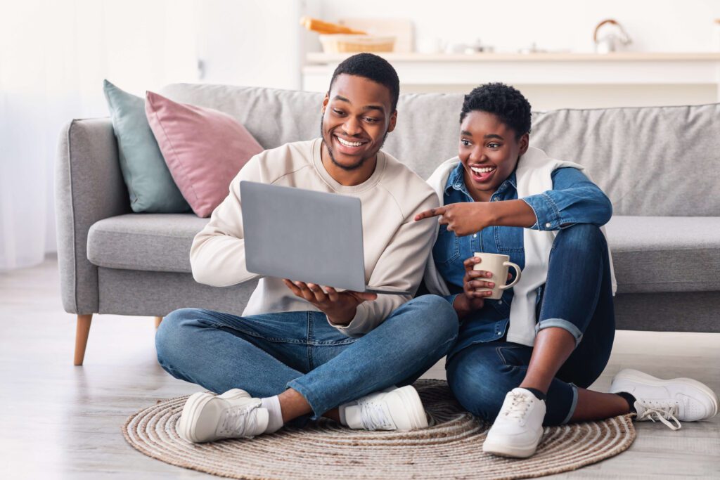 Couple looking at laptop