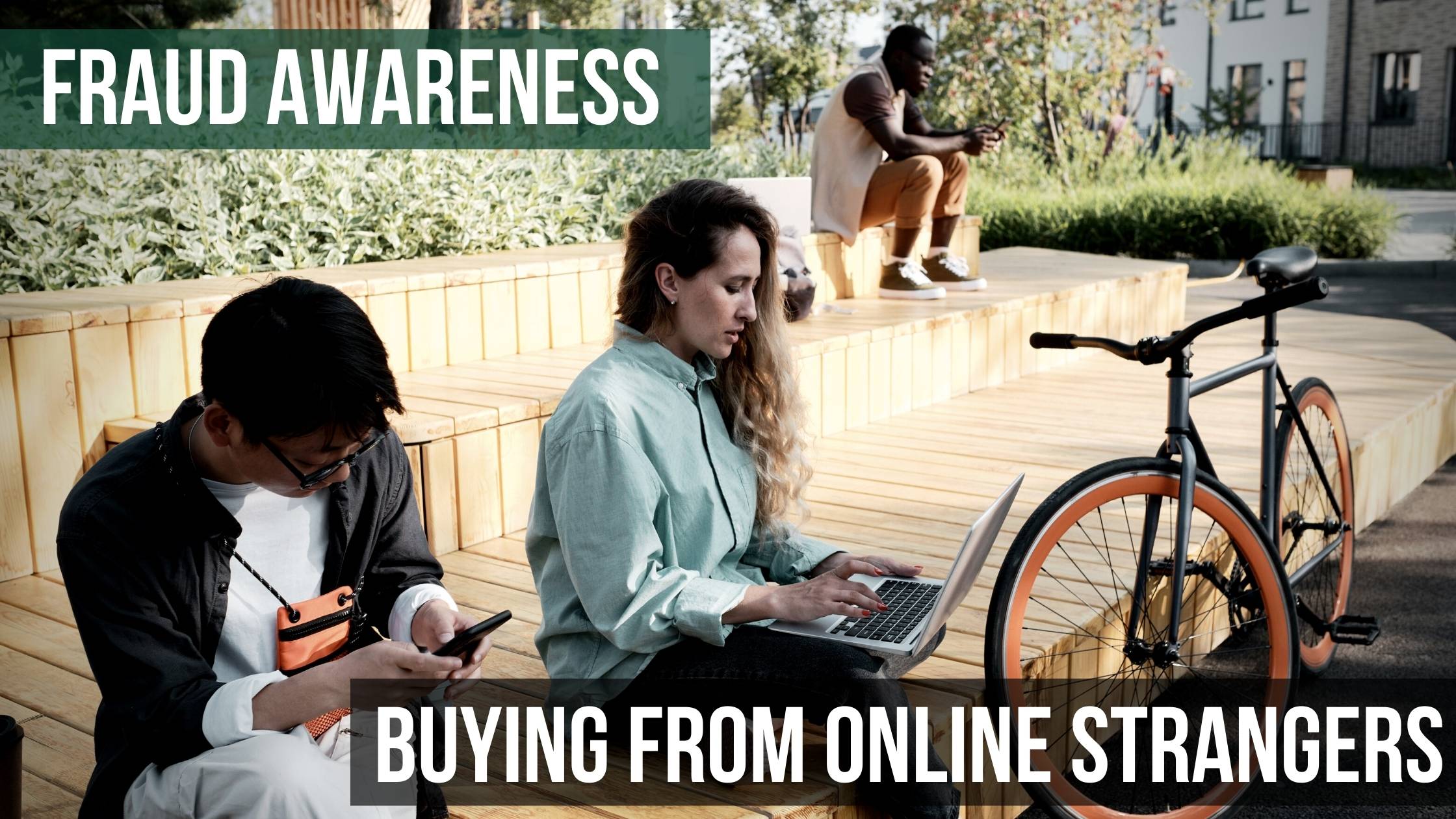 People in a park on their devices